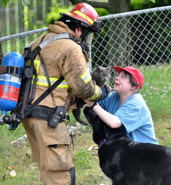 This firefighter risked his life to save one woman's beloved cat.